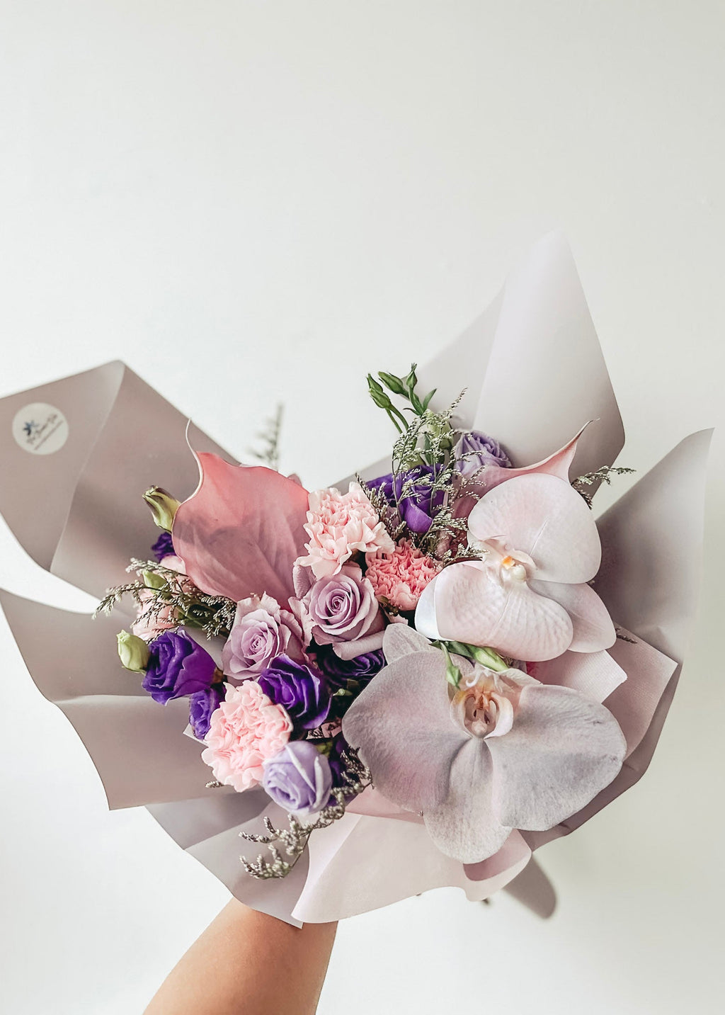 (With Phalaenopsis) Lilian- 12 stalks mixed Lilac roses & Pink Carnations